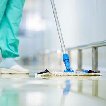 Janitor mopping floor